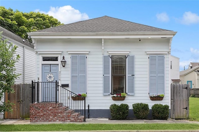 2116 Delachaise St, New Orleans, LA 70115 - view of front of property with a shingled roof