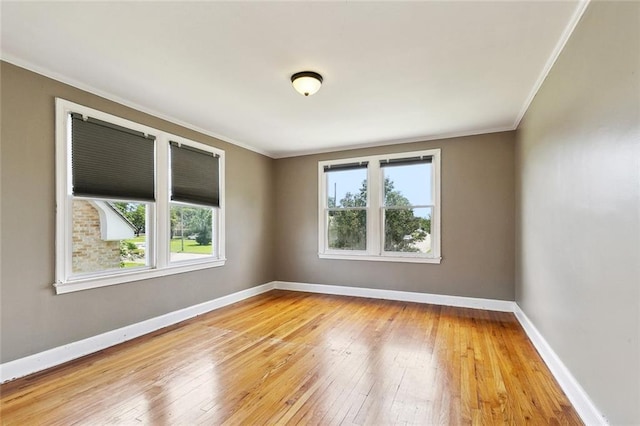 4959 Elysian Fields Ave, New Orleans, LA 70122 - unfurnished room featuring ornamental molding, light wood finished floors, and baseboards