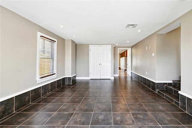 4959 Elysian Fields Ave, New Orleans, LA 70122 - unfurnished living room featuring recessed lighting and tile patterned floors