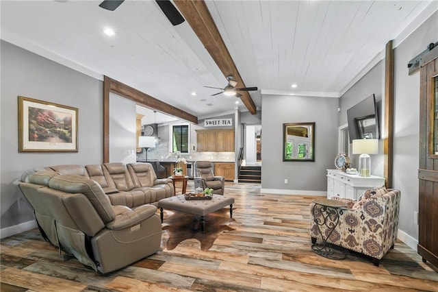 18064 Faller Rd, Tickfaw, LA 70466 - living area featuring ceiling fan, baseboards, light wood-style floors, recessed lighting, and a barn door