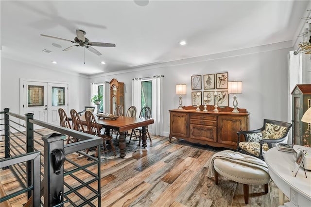 18064 Faller Rd, Tickfaw, LA 70466 - dining room featuring light wood finished floors, ceiling fan, ornamental molding, and recessed lighting