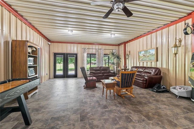 18064 Faller Rd, Tickfaw, LA 70466 - living room with french doors, a ceiling fan, and stone finish flooring