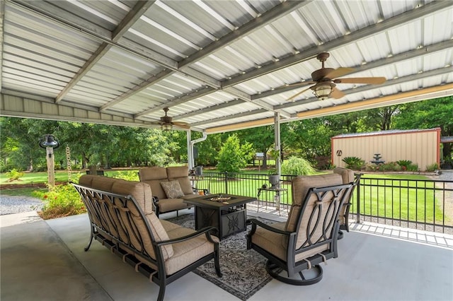 18064 Faller Rd, Tickfaw, LA 70466 - view of patio featuring ceiling fan and an outdoor living space with a fire pit