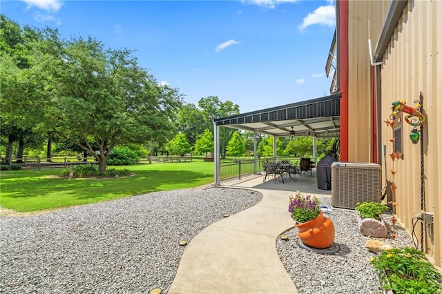 18064 Faller Rd, Tickfaw, LA 70466 - view of yard with a patio and view of wooded area