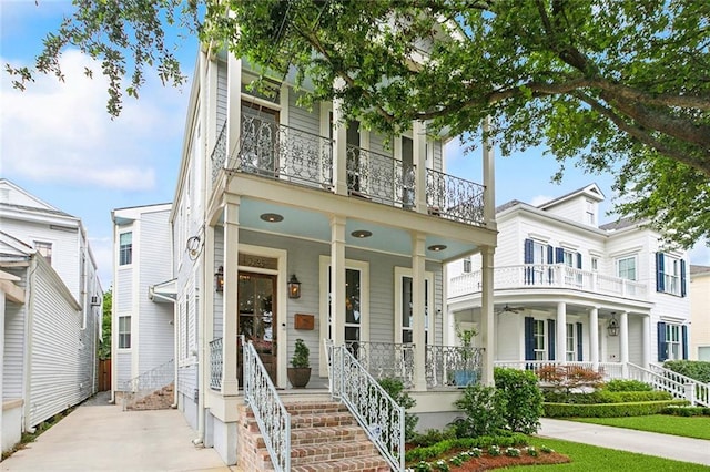 1026 Valence St, New Orleans, LA 70115 - view of front of house featuring a balcony and a porch