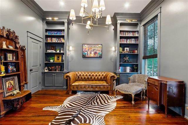 1026 Valence St, New Orleans, LA 70115 - living area with ornamental molding, wood finished floors, healthy amount of natural light, a chandelier, and built in features