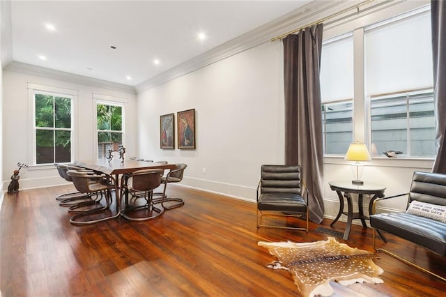 1026 Valence St, New Orleans, LA 70115 - dining space featuring baseboards, crown molding, wood finished floors, and recessed lighting