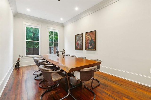 1026 Valence St, New Orleans, LA 70115 - dining area featuring ornamental molding, dark wood finished floors, and baseboards