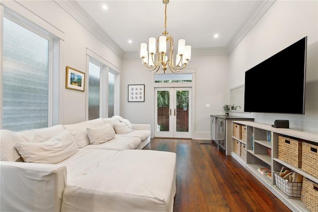 1026 Valence St, New Orleans, LA 70115 - living room with french doors, a chandelier, dark wood-style floors, ornamental molding, and baseboards