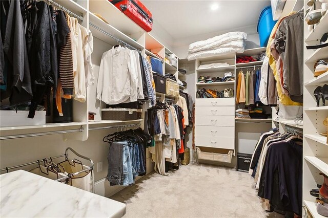 1026 Valence St, New Orleans, LA 70115 - walk in closet featuring carpet flooring