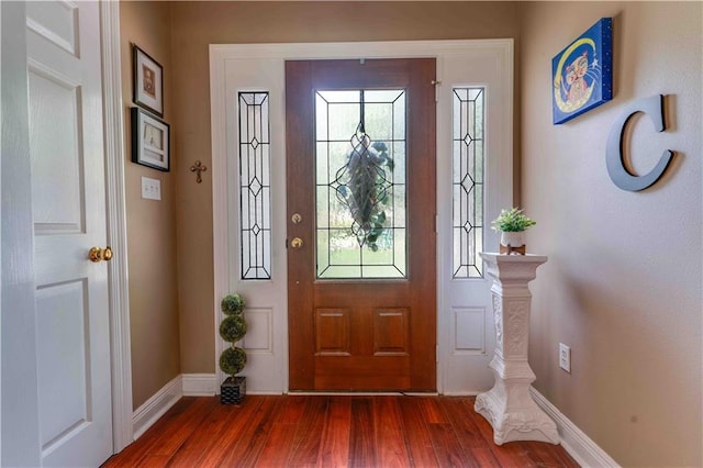 52 Hickory Dr, Covington, LA 70433 - entryway with dark wood-style flooring and baseboards