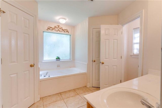 52 Hickory Dr, Covington, LA 70433 - full bathroom featuring a bath, vanity, and tile patterned floors