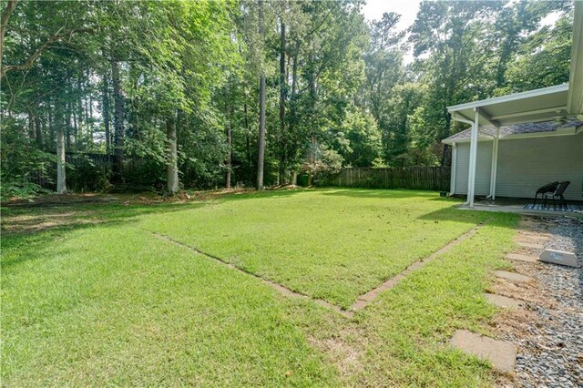 52 Hickory Dr, Covington, LA 70433 - view of yard with a patio