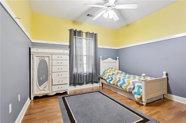 810 Still Ct, Madisonville, LA 70447 - bedroom featuring wood finished floors, baseboards, and a ceiling fan