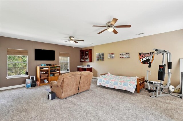 810 Still Ct, Madisonville, LA 70447 - carpeted living room featuring healthy amount of natural light, ceiling fan, and baseboards