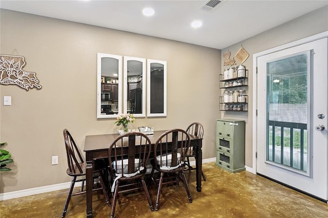 258 S Park Cir, Ponchatoula, LA 70454 - dining room with concrete floors, baseboards, and recessed lighting