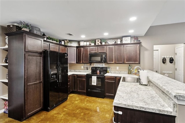 258 S Park Cir, Ponchatoula, LA 70454 - kitchen with black appliances, a sink, dark brown cabinetry, a peninsula, and light countertops