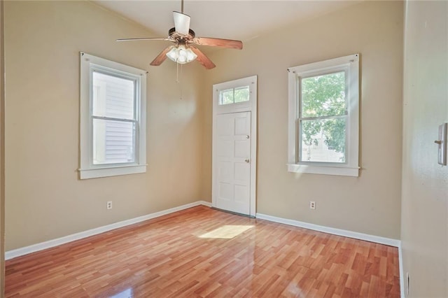 3337 Saint Ann St, New Orleans, LA 70119 - entryway with light wood-style floors, ceiling fan, and baseboards