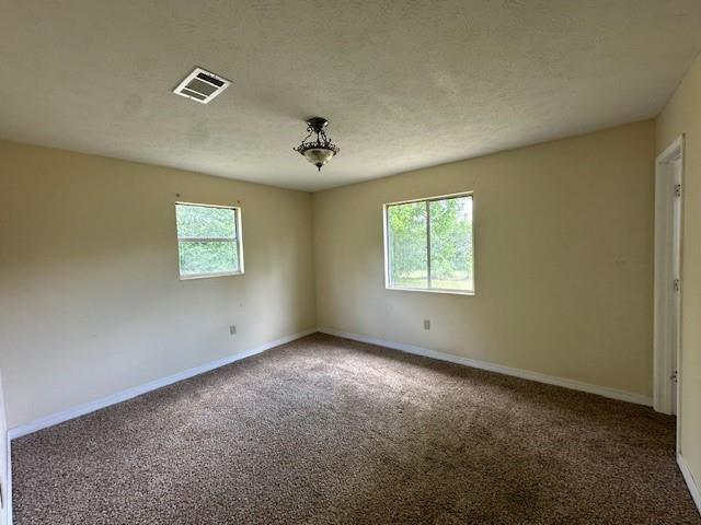 44373 Elmer Magee Rd, Franklinton, LA 70438 - unfurnished room featuring carpet and baseboards