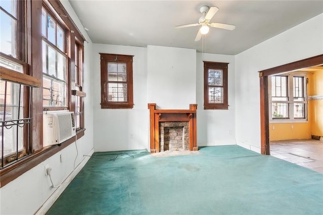 2239 General Taylor St, New Orleans, LA 70115 - unfurnished living room with a fireplace with flush hearth, plenty of natural light, carpet floors, and ceiling fan