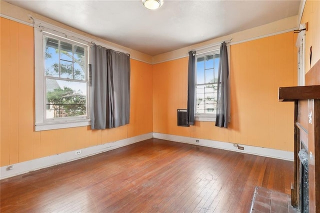 2239 General Taylor St, New Orleans, LA 70115 - unfurnished room featuring wood-type flooring and plenty of natural light