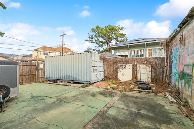 2239 General Taylor St, New Orleans, LA 70115 - fenced backyard with a patio and a gate