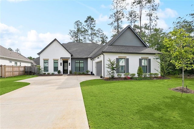 121 Chateau Papillon Ln, Mandeville, LA 70471 - modern farmhouse with concrete driveway, an attached garage, a shingled roof, and stucco siding