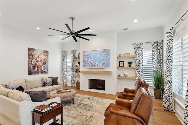 121 Chateau Papillon Ln, Mandeville, LA 70471 - living area featuring ceiling fan, plenty of natural light, light wood-style flooring, and recessed lighting