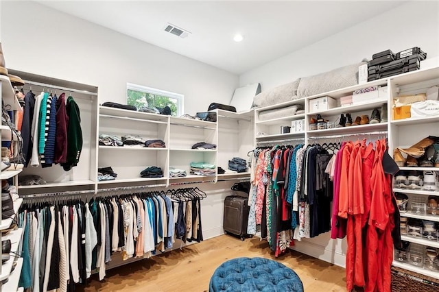 121 Chateau Papillon Ln, Mandeville, LA 70471 - walk in closet with wood finished floors