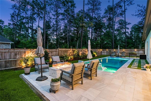 121 Chateau Papillon Ln, Mandeville, LA 70471 - view of pool with an outdoor fire pit, a patio, and a fenced backyard