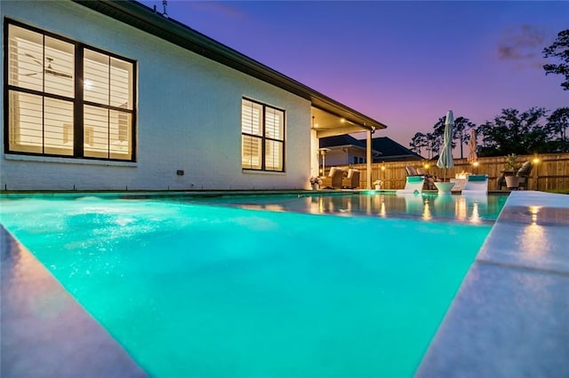 121 Chateau Papillon Ln, Mandeville, LA 70471 - view of pool at dusk