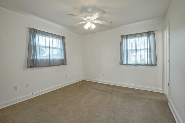3617 Tartan Dr, Metairie, LA 70003 - unfurnished room featuring healthy amount of natural light, a ceiling fan, and carpet floors