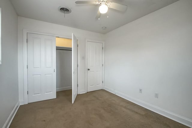 3617 Tartan Dr, Metairie, LA 70003 - unfurnished bedroom with carpet floors, a closet, and a ceiling fan