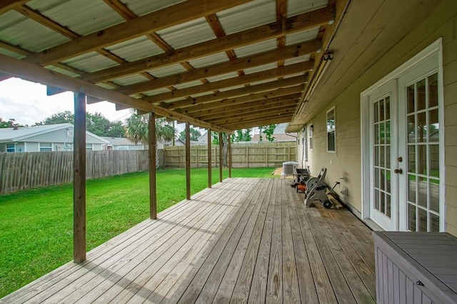 3617 Tartan Dr, Metairie, LA 70003 - wooden terrace with french doors and a fenced backyard