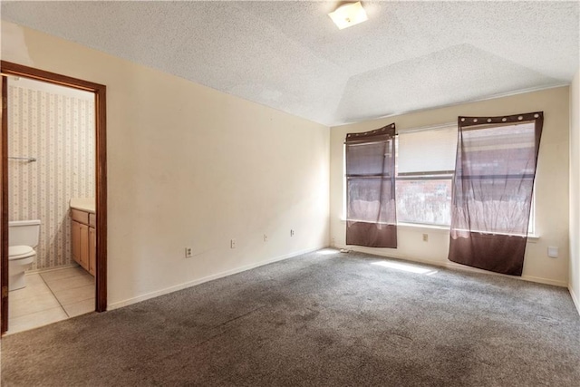 2577 Foliage Dr, Marrero, LA 70072 - unfurnished room with a textured ceiling and light colored carpet