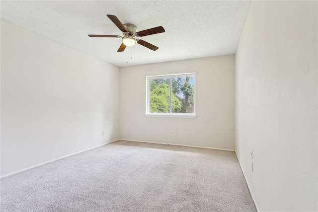 119 N Queens Dr, Slidell, LA 70458 - empty room featuring light colored carpet, a ceiling fan, and baseboards