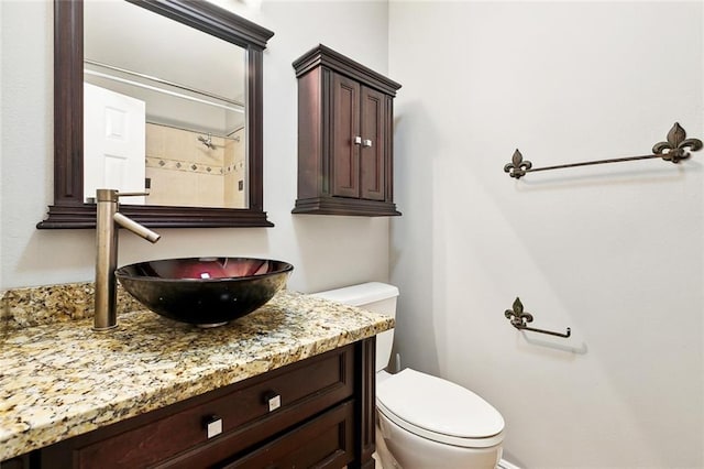 2716 Mayflower St, Meraux, LA 70075 - bathroom featuring toilet, vanity, and a shower