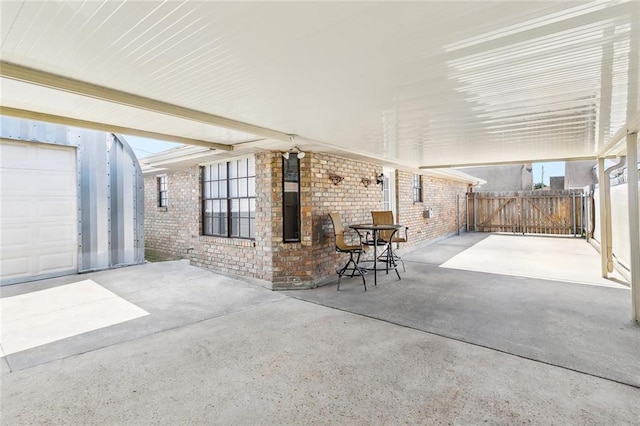 2716 Mayflower St, Meraux, LA 70075 - view of patio with a garage