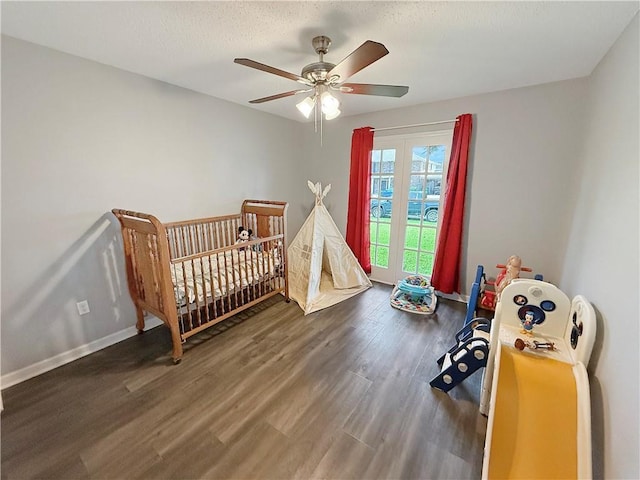 8809 Belle Grove Pl, River Ridge, LA 70123 - bedroom with wood finished floors, baseboards, and ceiling fan