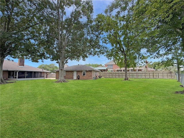 8809 Belle Grove Pl, River Ridge, LA 70123 - view of yard featuring a sunroom