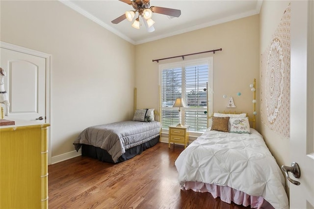 404 Southdown Loop, Covington, LA 70433 - bedroom featuring wood finished floors, crown molding, baseboards, and a ceiling fan