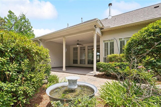 404 Southdown Loop, Covington, LA 70433 - back of property featuring ceiling fan and a patio