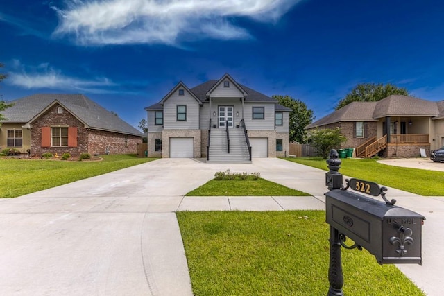 322 Spartan Loop, Slidell, LA 70458 - view of front of property featuring stairs, an attached garage, driveway, and brick siding