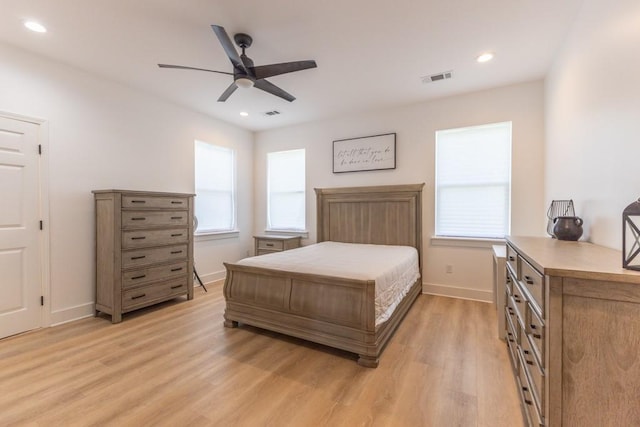 322 Spartan Loop, Slidell, LA 70458 - bedroom with light wood-type flooring, baseboards, recessed lighting, and ceiling fan