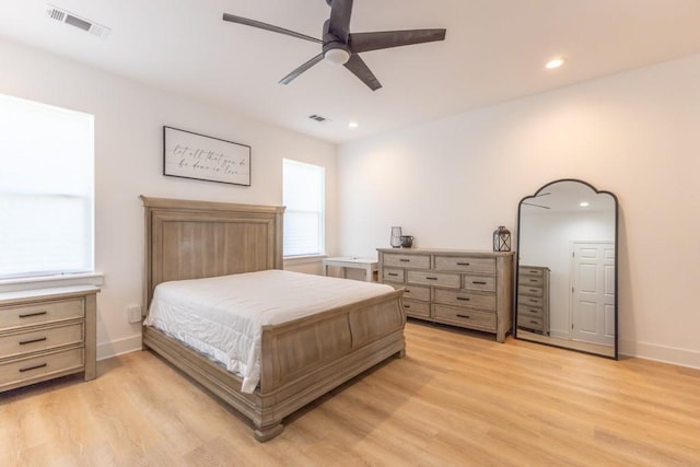 322 Spartan Loop, Slidell, LA 70458 - bedroom with light wood-style flooring, recessed lighting, baseboards, and a ceiling fan