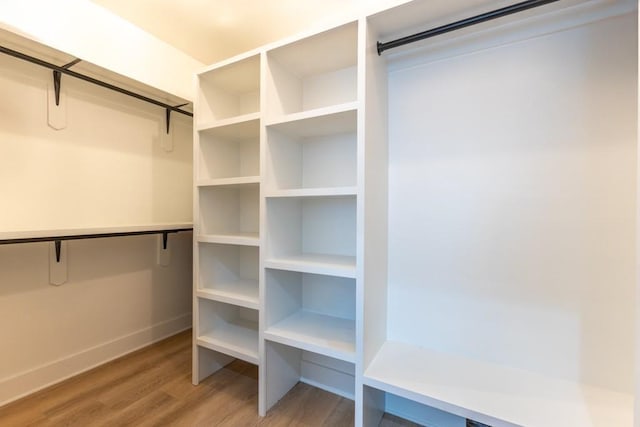 322 Spartan Loop, Slidell, LA 70458 - spacious closet featuring wood finished floors