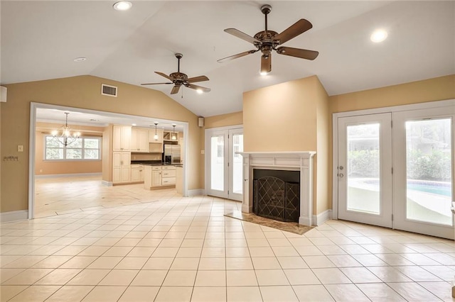 6219 Perlita Dr, New Orleans, LA 70122 - unfurnished living room featuring vaulted ceiling, ceiling fan, a fireplace, baseboards, and recessed lighting