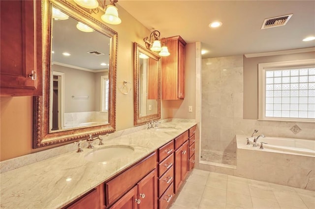 6219 Perlita Dr, New Orleans, LA 70122 - bathroom with a bath, double vanity, healthy amount of natural light, tile patterned flooring, and ornamental molding