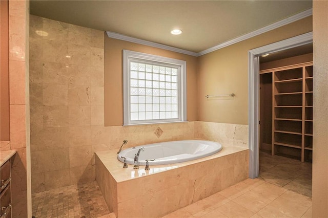 6219 Perlita Dr, New Orleans, LA 70122 - full bathroom featuring a garden tub, ornamental molding, tile patterned flooring, a spacious closet, and vanity