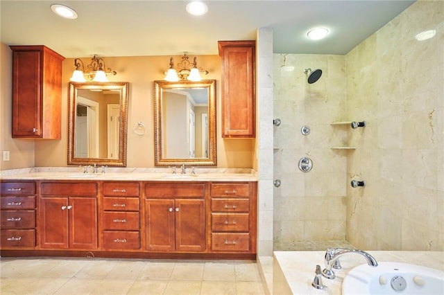 6219 Perlita Dr, New Orleans, LA 70122 - full bath featuring a tub with jets, double vanity, a tile shower, tile patterned flooring, and recessed lighting